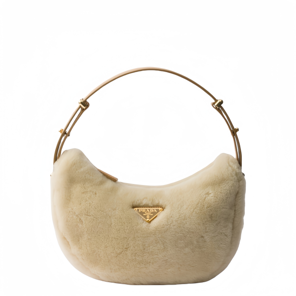 Arqué shearling and leather shoulder bag
